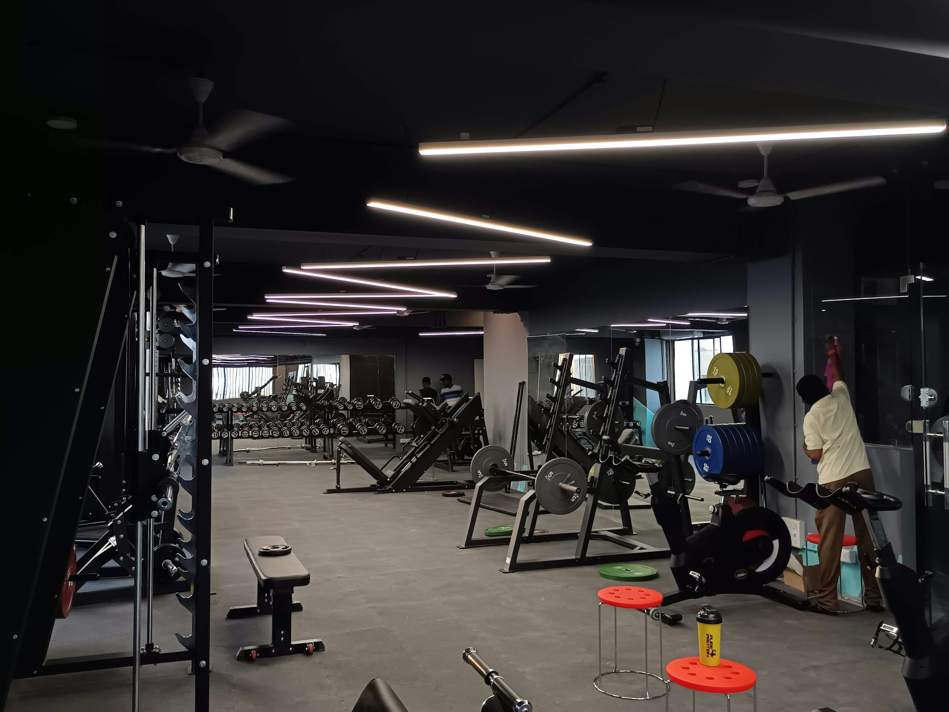 a gym filled with lots of exercise equipment